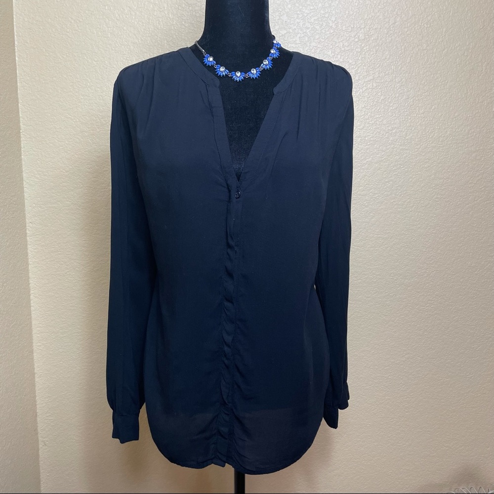 Long sleeve V-Neck Black Top with button front.